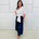 Navy Linen Tiered 7/8s length Skirt. White Linen shirt with short sleeves and side tie detail.
