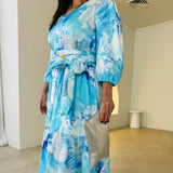 Blue floral print, v-neckline,3/4 gathered sleeve, ankle length dress with sash