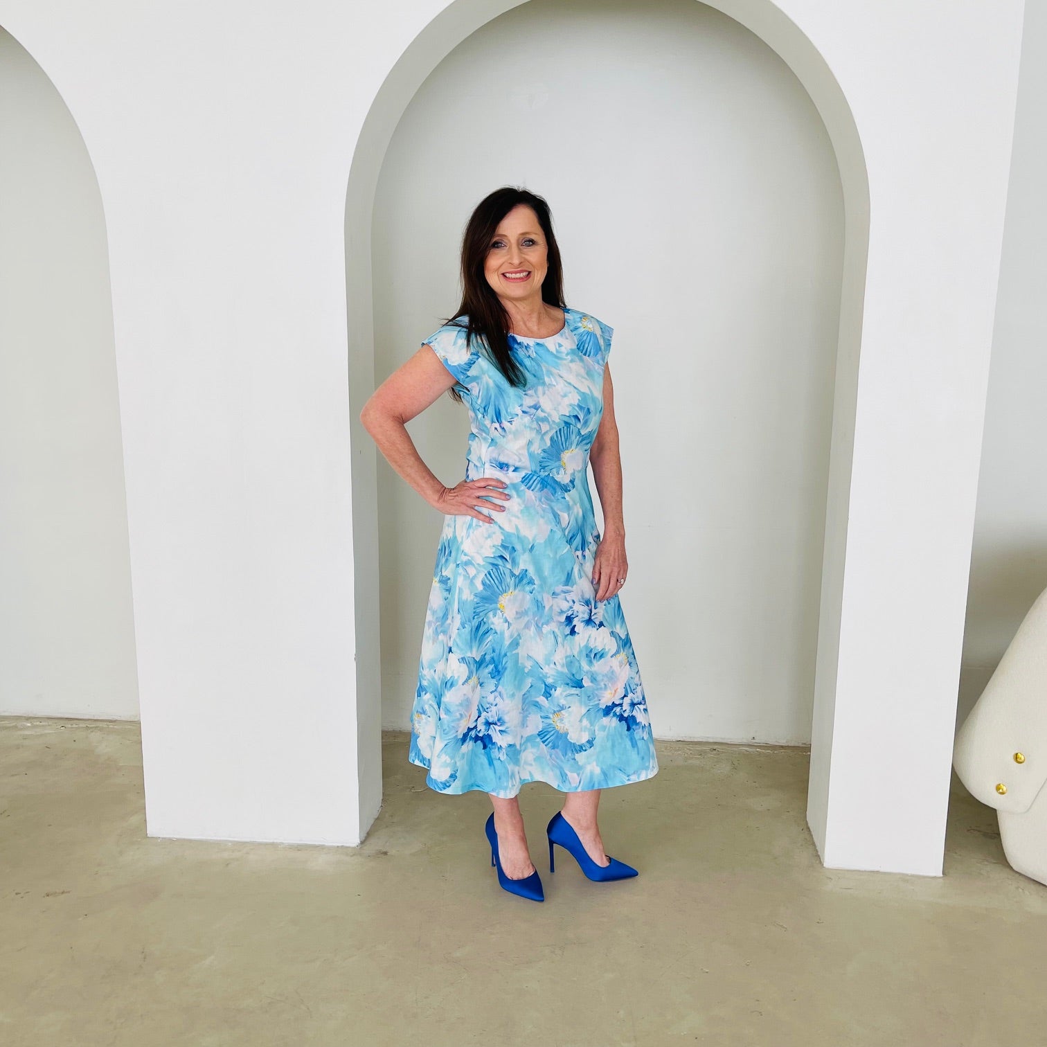 Blue,white,navy floral print, round/boat neckline, capped sleeve, slight a-line skirt,mid length dress.