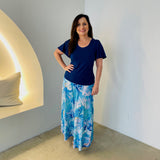 Long, maxi length, blue floral skirt with stretch elastic waistband,with navy blue, round neckline,short sleeve top.