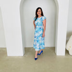 Blue,white,navy floral print, round/boat neckline, capped sleeve, slight a-line skirt,mid length dress.