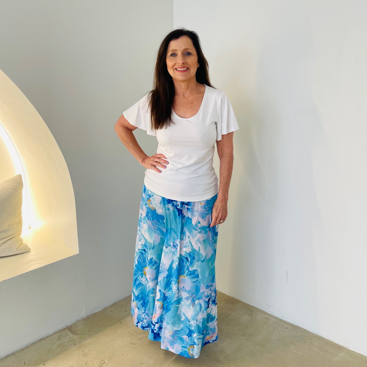 Long, maxi length, blue floral skirt with stretch elastic waistband,with white bamboo, round neckline,short sleeve top