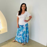 Long, maxi length, blue floral skirt with stretch elastic waistband,with white bamboo, round neckline,short sleeve top
