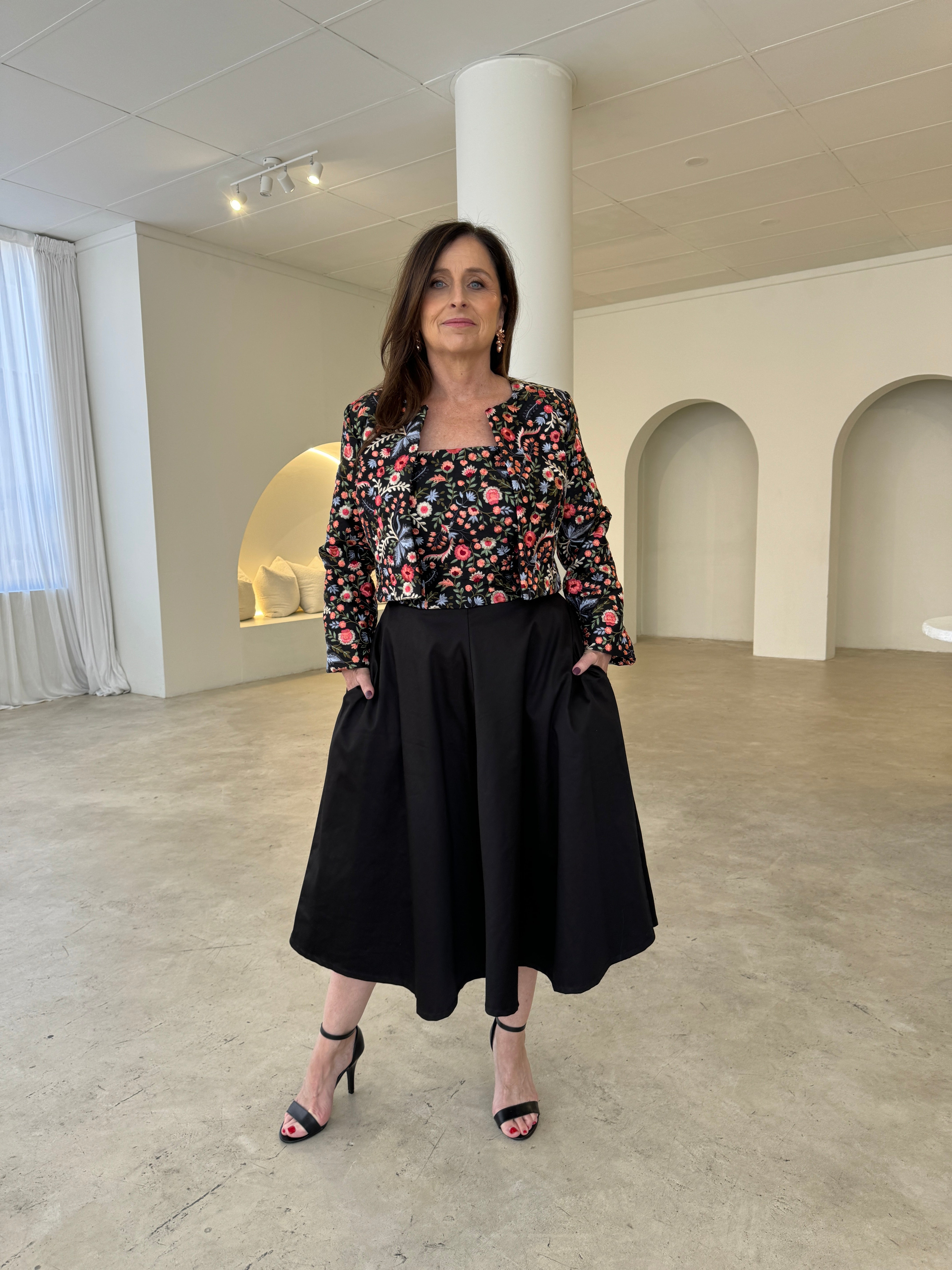 Floral embroidered strapless, Aline gown with pockets, with matching short, bolero jacket.