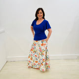 Long, maxi, white base, multicoloured floral print, flared, aline skirt with wide elastic stretch waistband and pockets. Cobalt blue, short sleeve, scoop neck. women's top.