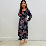Patterned print dress in colors of red,blue,white, black, long fitted sleeve, with square neckline, flattering waistline seam, panelled, a line , midi length dress.
