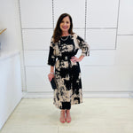 Black and beige print, 3/4 sleeve, midi length dress for special event wear. Relaxed fit evening dress for special event wear.