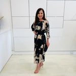 Black and beige print, 3/4 sleeve, midi length dress for special event wear.