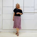 Black, relaxed fit, loose line, off the shoulder, asymmetrical neckline top. Made in Australia.
