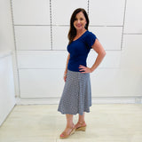 Blue midi length, stretch, a-line skirt, with blue, cross over, short sleeve, scoop neckline, fitted top