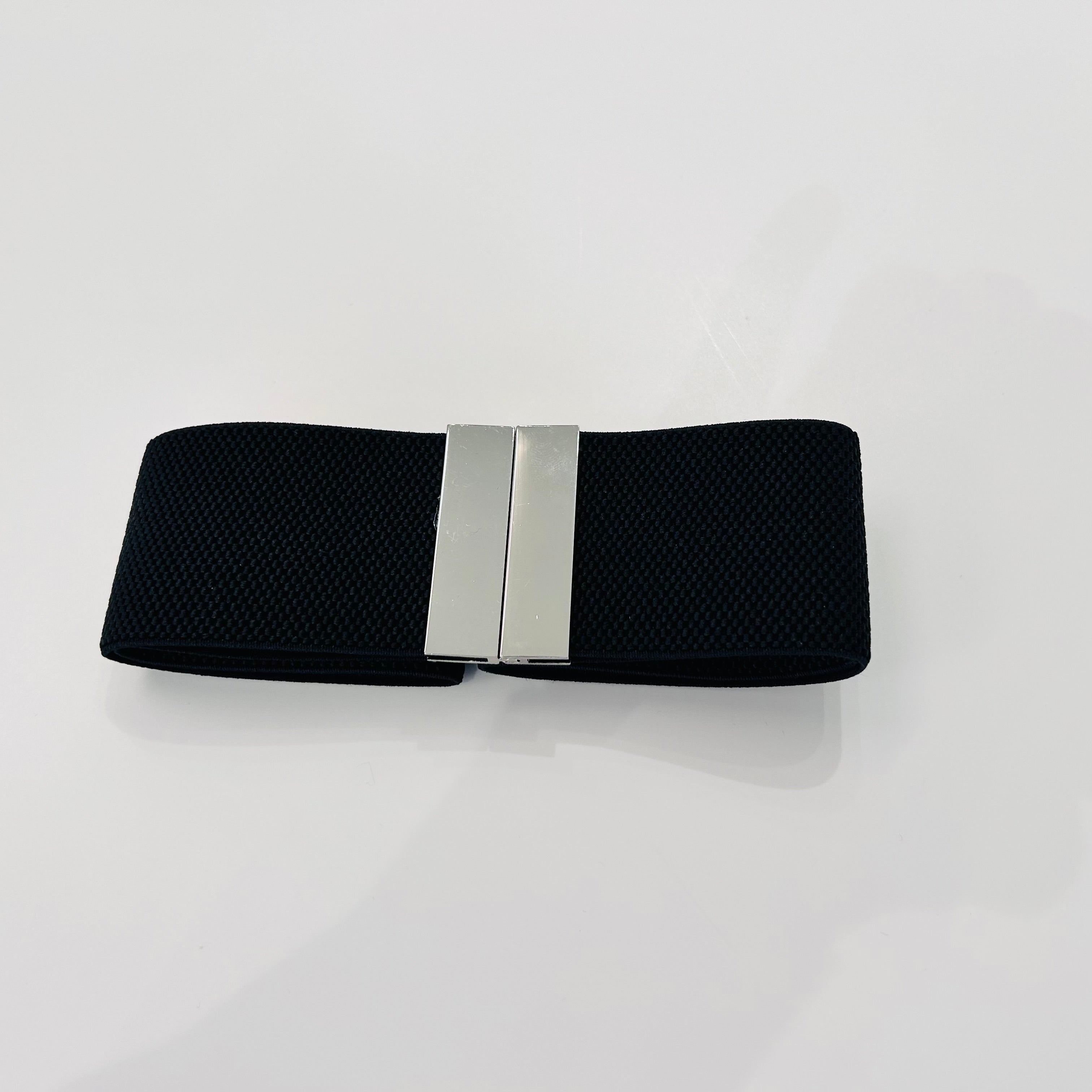 Black stretch elastic belt with a silver clip buckle
