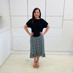 Green,black and white print, stretch, slight a-line skirt, with small ruffle on hemline, & black bamboo, short sleeve, scoop neckline, relaxed fit top