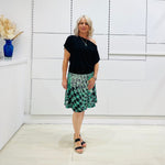 Black, off the shoulder, asymmetrical neckline, relaxed fit top.