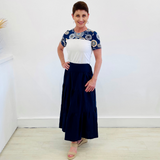 Navy Linen Tiered 7/8s length Skirt. White yellow t-shirt with spirograph neck and sleeve detail.