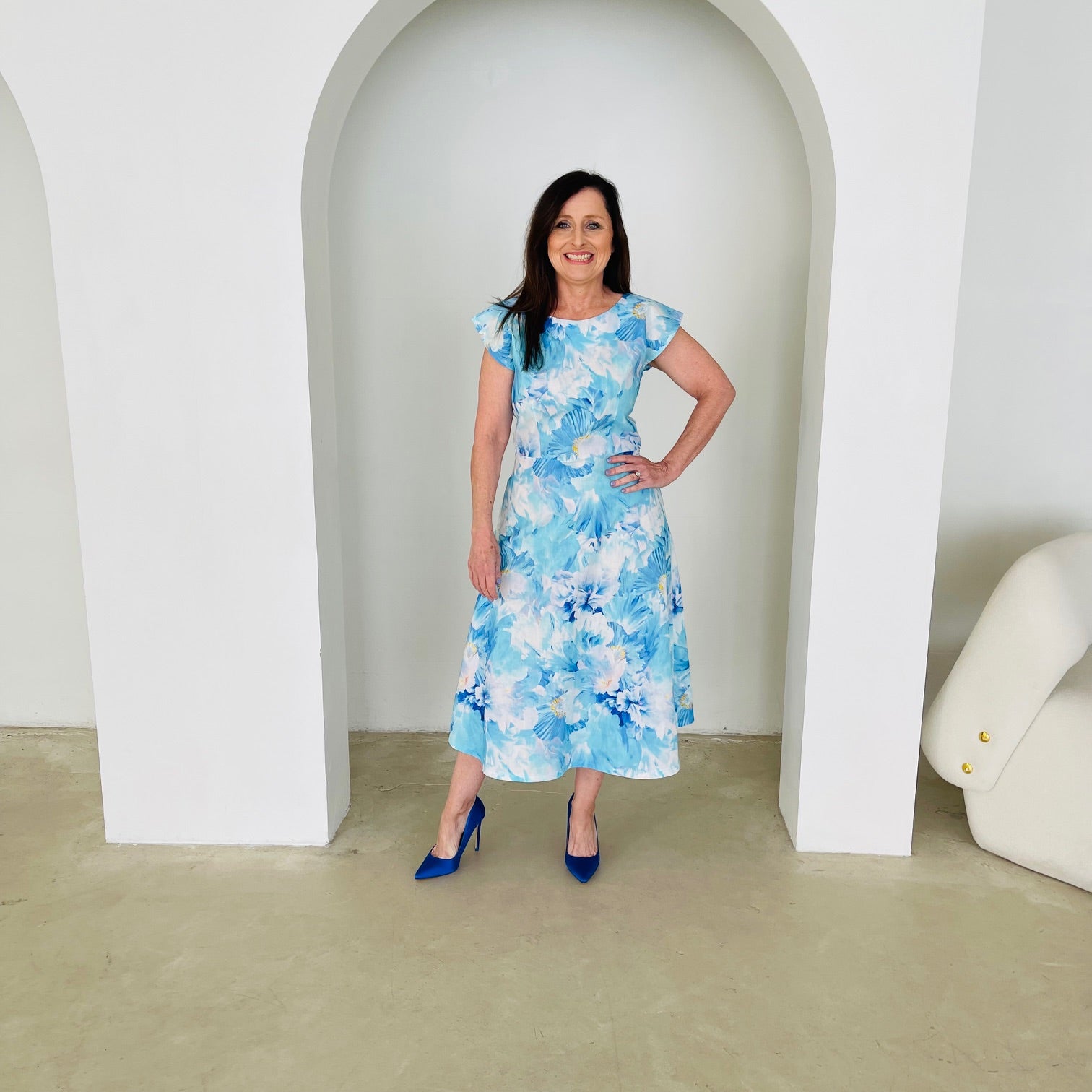 Blue,white,navy floral print, round/boat neckline, capped sleeve, slight a-line skirt,mid length dress.