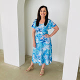 Blue floral, round neckline, short wave sleeve top with matching midi length skirt.