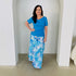 Long, maxi length, blue floral skirt with stretch elastic waistband,with turquiose blue, cowl neckline,short sleeve top.