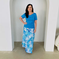 Long, maxi length, blue floral skirt with stretch elastic waistband,with turquiose blue, cowl neckline,short sleeve top.