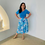 Blue & white floral print, midi length, stretch, a-line skirt,with stretch elastic waistband, blue short sleeve, round neck top