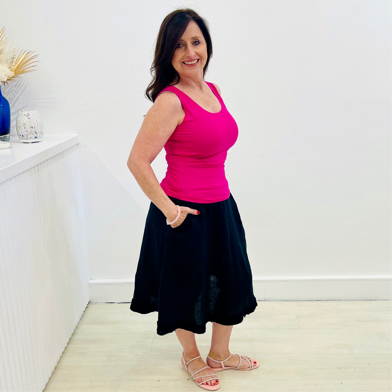 Black linen, midi length, skirt with lace detail on hemline,stretch elastic waistband, worn with pink bamboo, sleeveless, summer  top.