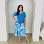 Blue & white floral print, midi length, stretch, a-line skirt,with stretch elastic waistband, blue short sleeve, round neck top