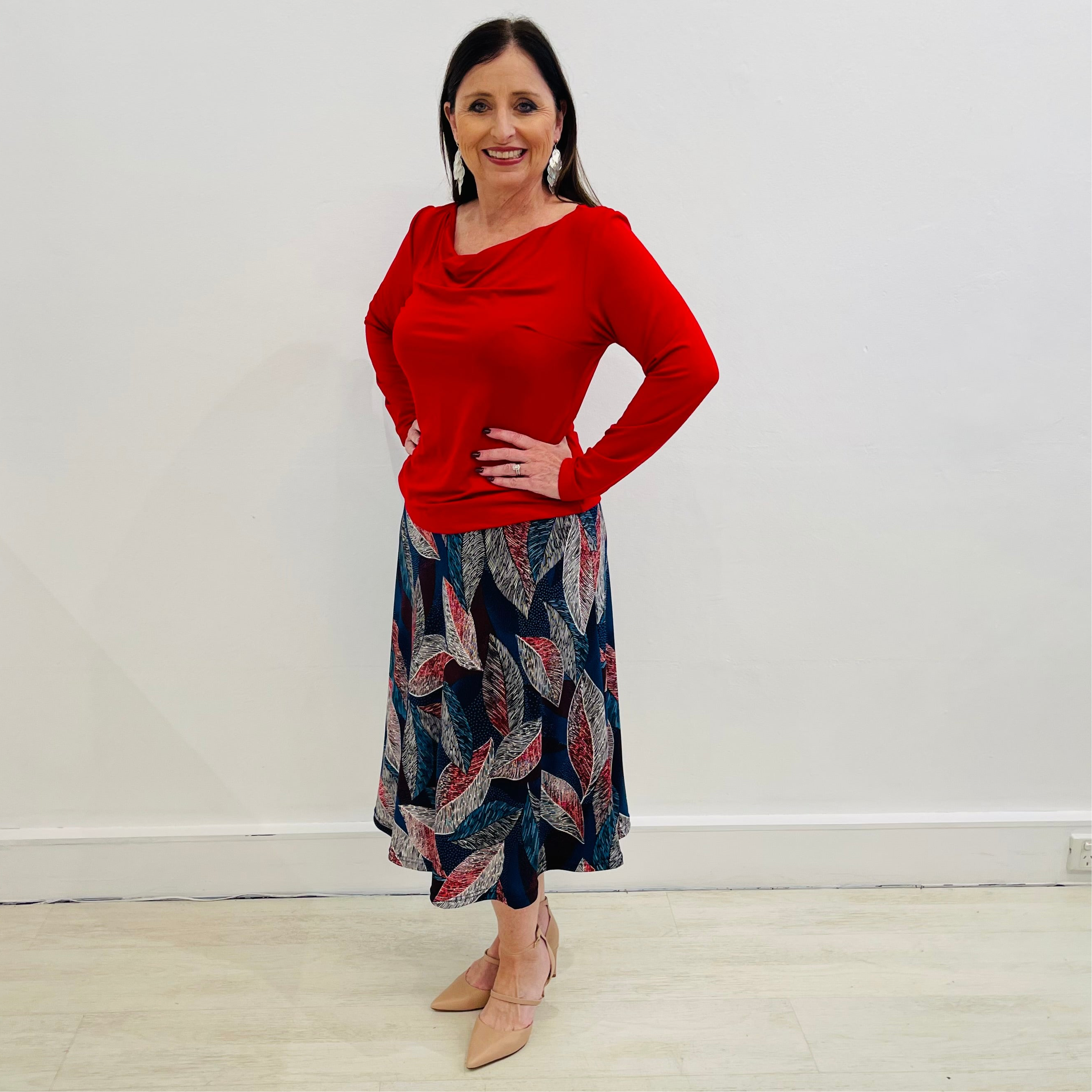 Red cowl neckline, long sleeve, bamboo top,With blue, red leave print, midi length, a line, stretch skirt.