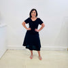 Black Linen Aline skirt with black cotton stretch waistband has pockets and a black trim of lace around the hemline