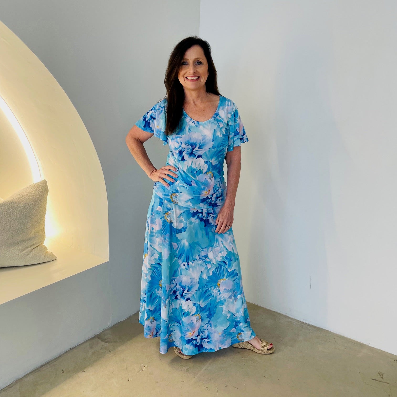 Blue floral, round neckline, short wave sleeve top with matching maxi length skirt.