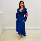 Sapphire Swirl Skirt, royal blue, soft drapey, full circle skirt with dipped hemline at back, wide flat waistband and pockets.  Scoop, round neckline, long,puff gathered sleeve, fitted women's top blouse