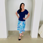 Navy bamboo, round neckline,short sleeve top. With midi length floral  skirt.