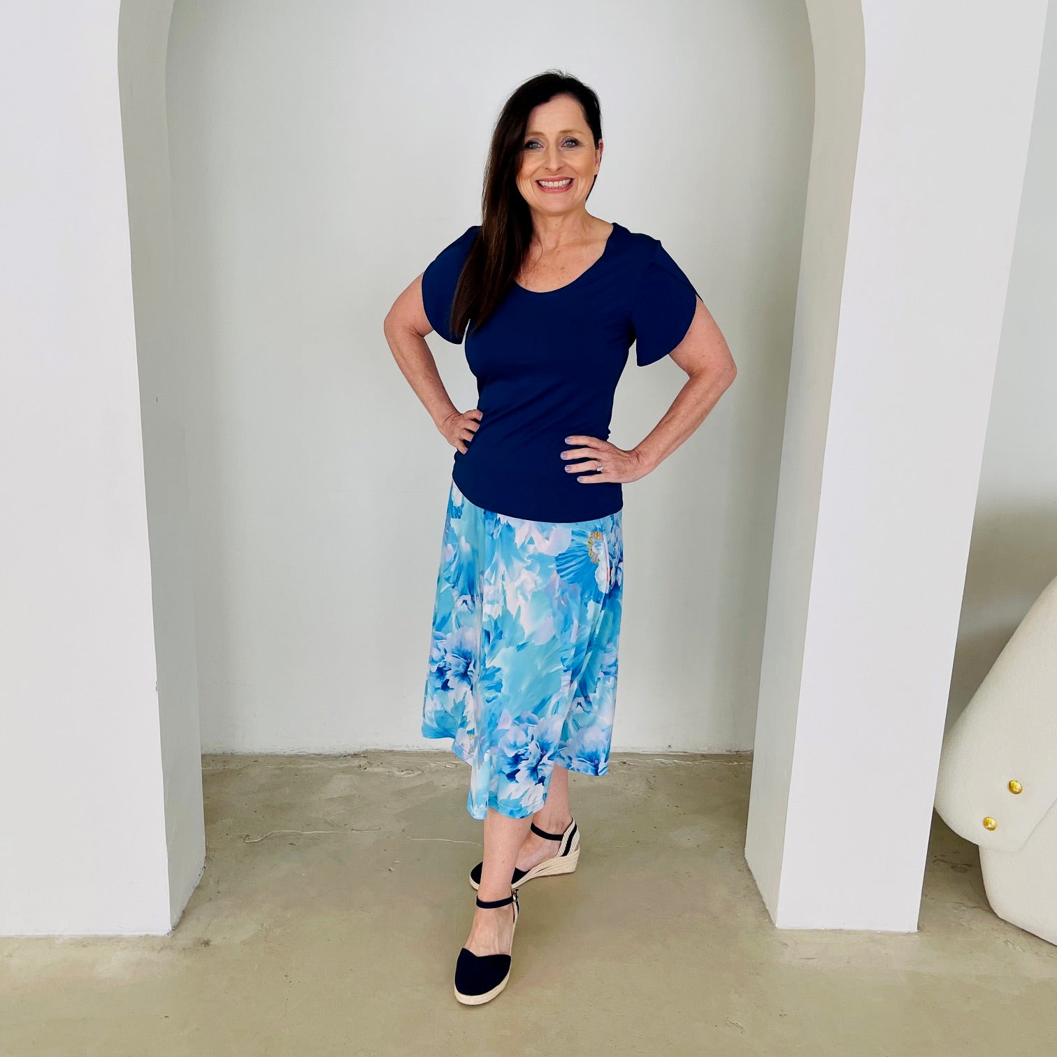 Navy bamboo, round neckline,short sleeve top. With midi length floral  skirt.