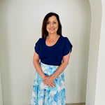 Navy bamboo, round neckline,short sleeve top. With maxi length floral linen skirt.