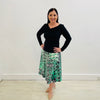 Black Bamboo Blend Cowl Neckline Top with Long Sleeves with our Natures Elegance Flat stretch waistband aline skirt with a black, green and white geometric/ animal print design 