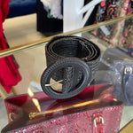 Black rattan, stretchy women's belt, 90 cm long, round buckle with silver coloured prong.
