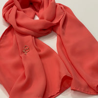 Coral coloured chiffon scarf