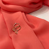 Coral coloured chiffon scarf