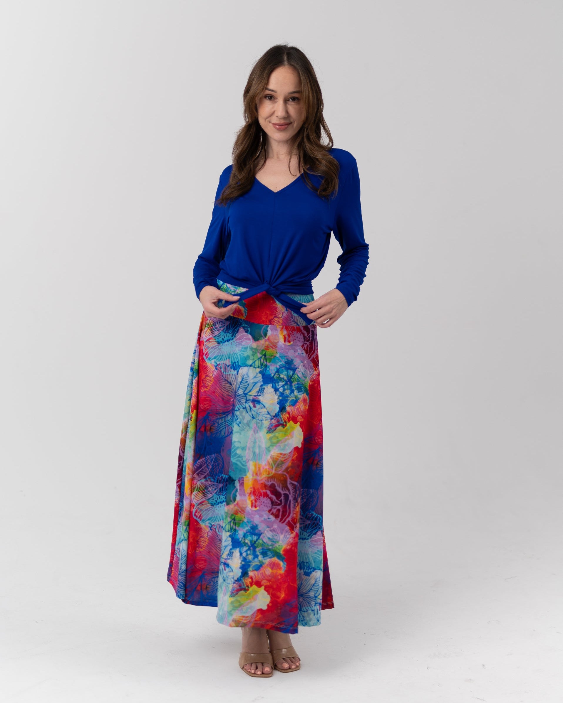 Woman wearing blue bamboo top and maxi skirt