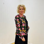 Black silk floral embroidered in colours of pink, green,red, blue, beige,fully lined tailored women's jacket.