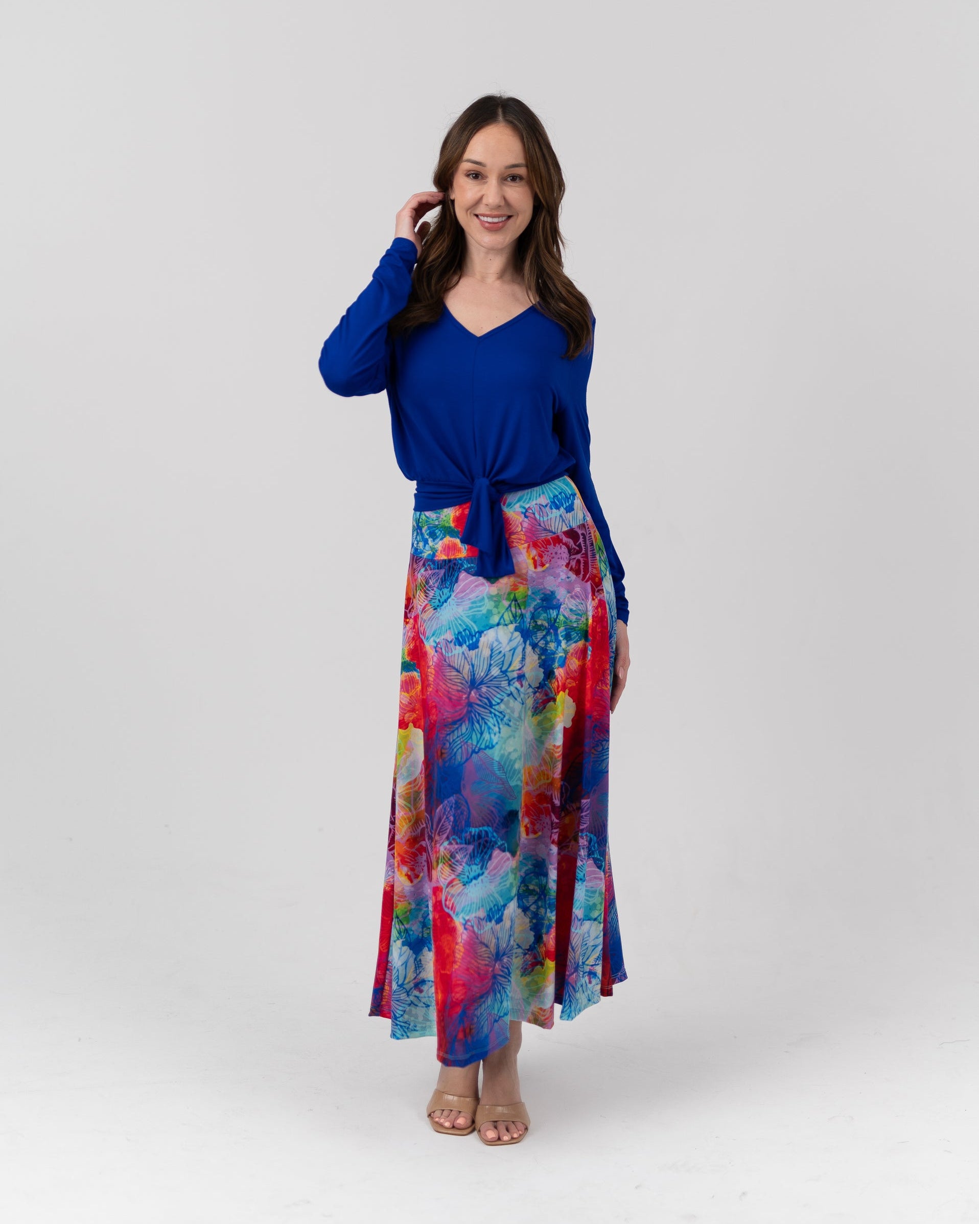 Model wearing Harpo Top and Maxi skirt in white room 