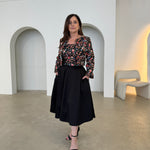 Black short, bolero jacket with all over multi coloured embroidery.With matching strapless embroidered bodice dress, with pockets .