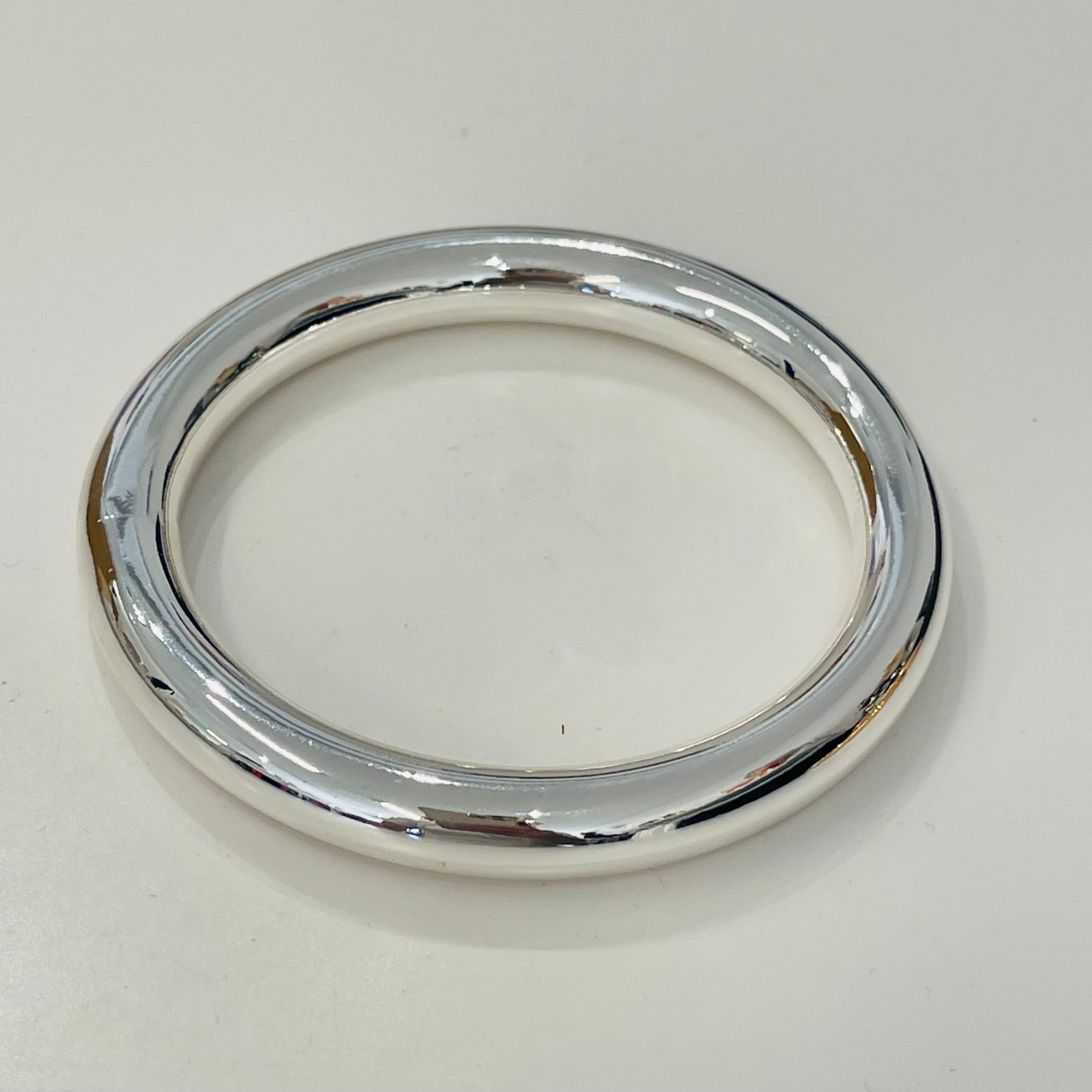Silver bracelet on a white background