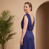 Navy blue dress on model in cream room