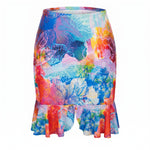 Colorful floral skirt with ruffled hem on a white background