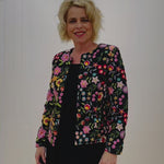 Black silk floral embroidered in colours of pink, green,red, blue, beige,fully lined tailored women's jacket.