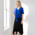 Model wearing blue top and black midi eclipse skirt