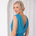 Model in white room wearing blue dress