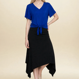Model wearing blue top and black midi eclipse skirt